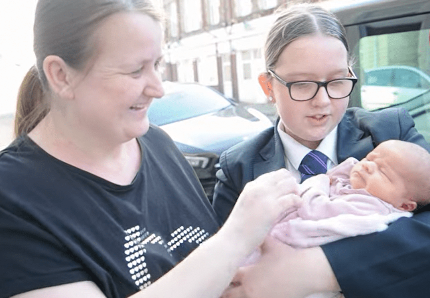 Nicola Thomas with Ellis Thomas who was holding her sister, Baylee-Rae in her arms.  |  Source: youtube.com/WalesOnline