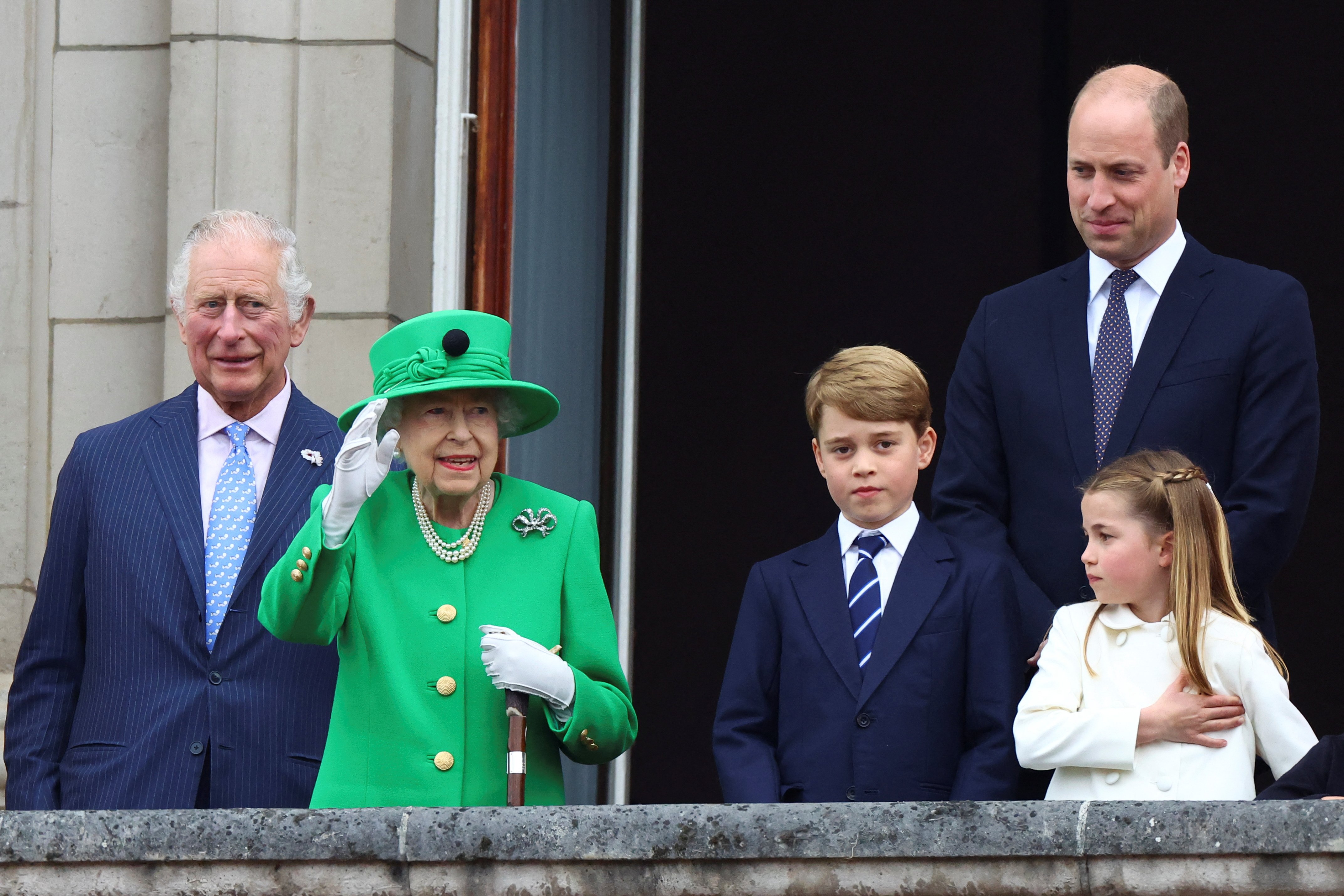 King Charles, Queen Elizabeth II, Prince George, Prince William and Princess Charlotte stand on a balcony during the Platinum Jubilee parade on June 5, 2022 in London, England.  |  Source: Getty Images