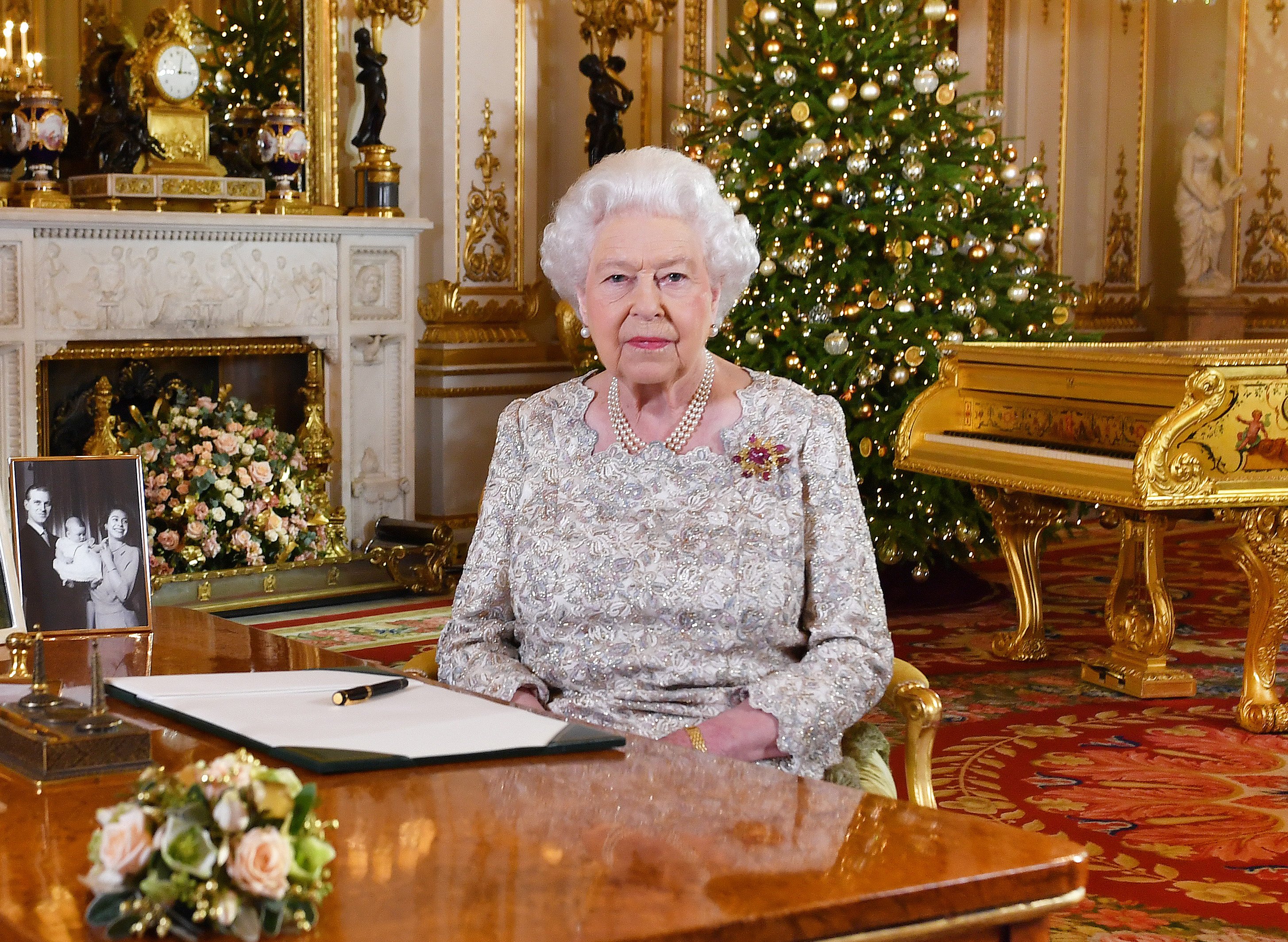 Queen Elizabeth II poses for a photo after recording her annual Christmas Day message in the White Drawing Room at Buckingham Palace in a photo released on December 24, 2018 in London, Britain.  |  Source: Getty Images