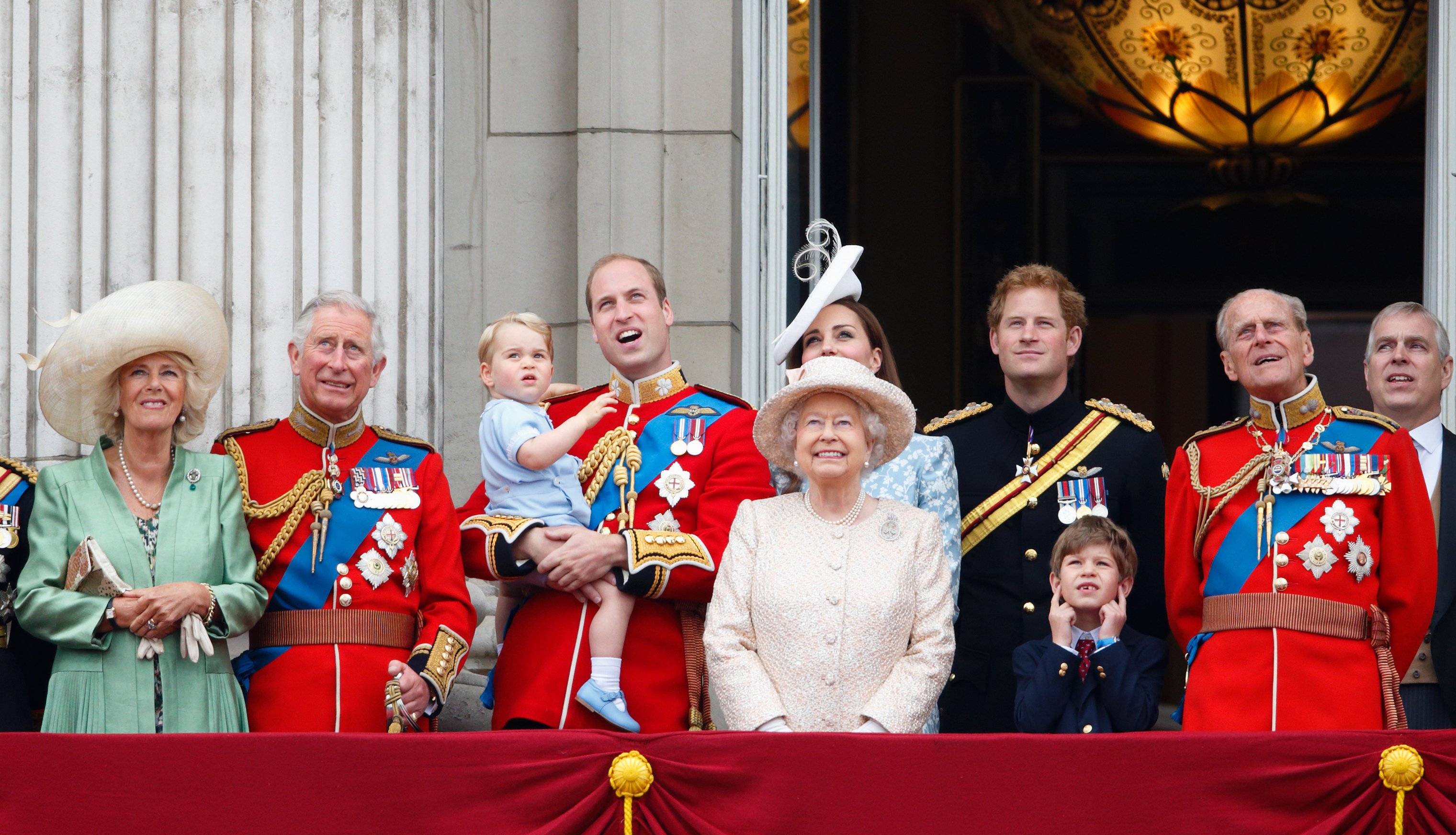 Camilla, the Queen Consort, King Charle, Prince William, Prince George, Catherine, the Duchess of Cambridge, Queen Elizabeth II, Prince Harry, James, Viscount Severn and Prince Philip, Duke of Edinburgh, standing on the balcony of Buckingham Palace during Trooping the Color on June 13, 2015 in London, England.  |  Source: Getty Images