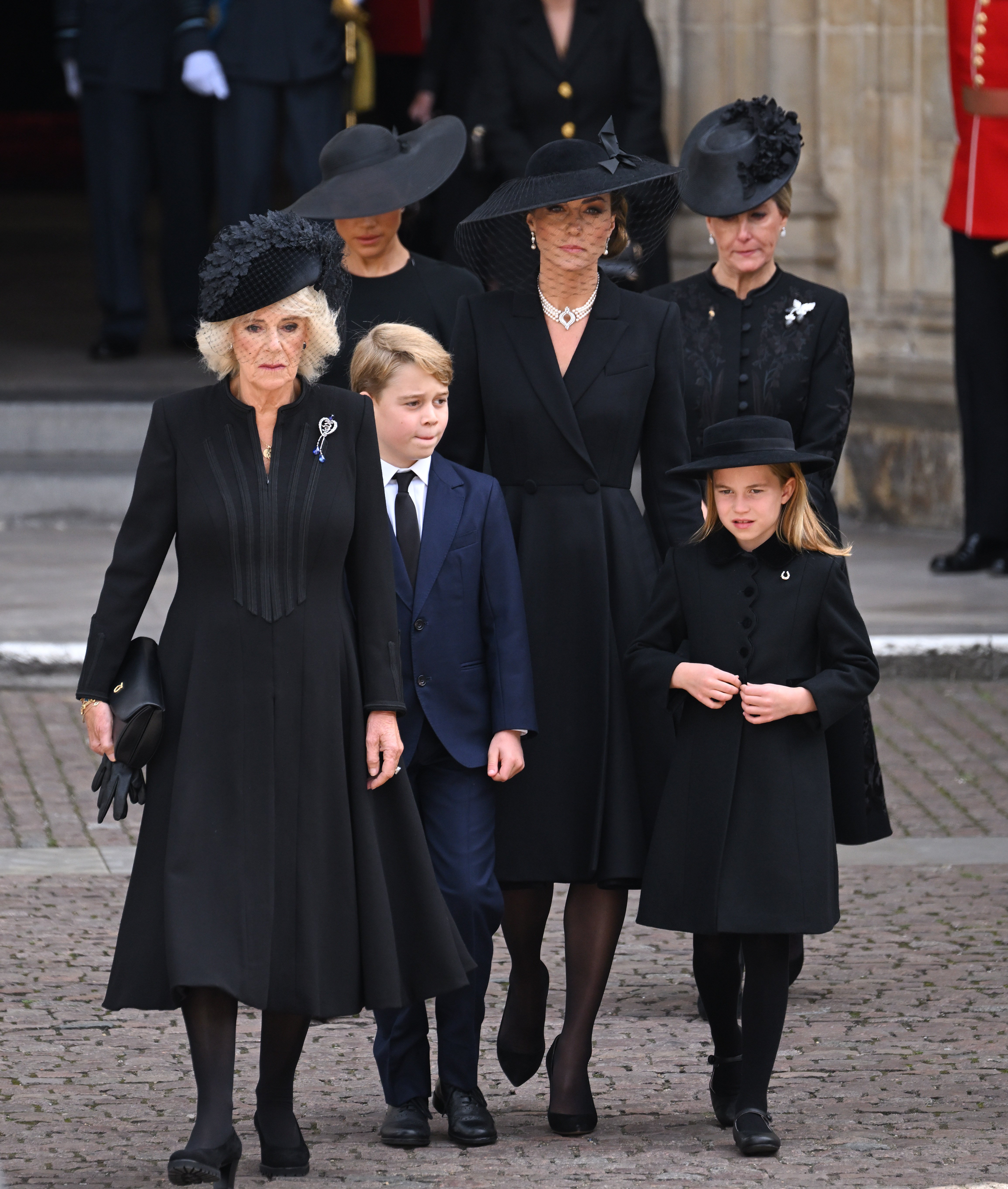 Amilla, Queen Consort, Meghan, Duchess of Sussex, Prince George of Wales, Catherine, Princess of Wales, Princess Charlotte of Wales, and Sophia, Countess of Wessex during Queen Elizabeth II's state funeral at Westminster Abbey on March 19. September 2022 in London, England |  Source: Getty Images 
