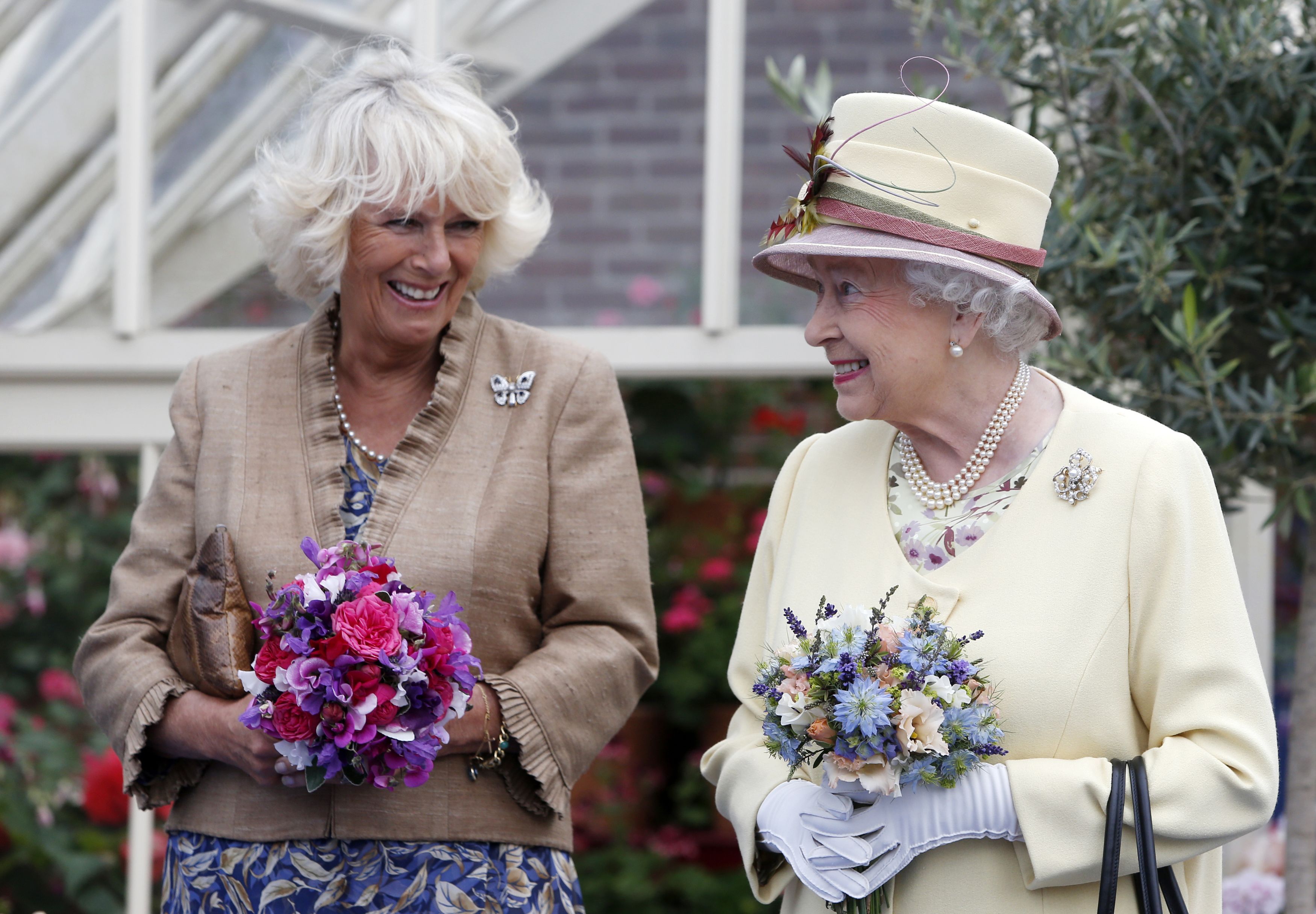 Queen Elizabeth II and the Queen Consort at Cumnock 2014. |  Source: Getty Images 