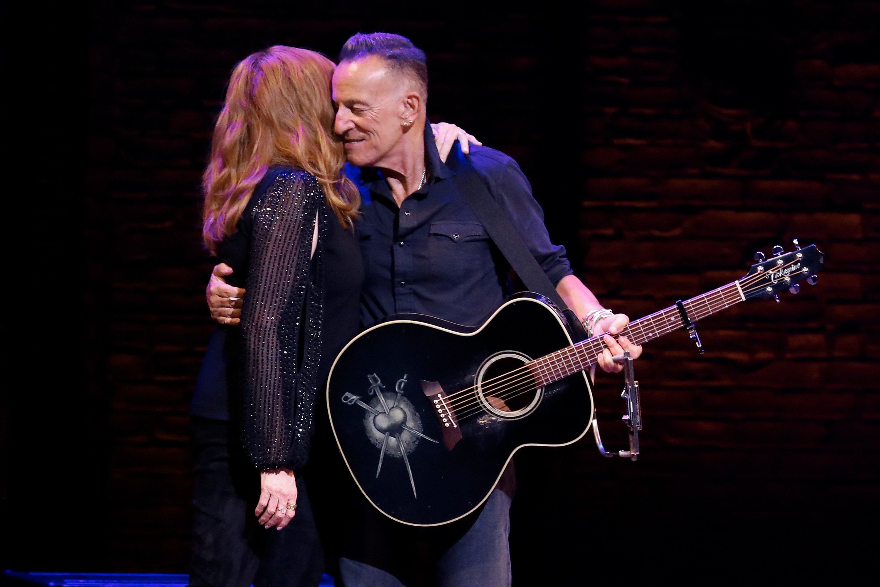 Bruce Springsteen and Patti Scialfa take a bow during the reopening night of "Springsteen on Broadway" for a full capacity vaccinated audience at the St. James Theater on June 26, 2021 in New York City.  |  Source: Getty Images