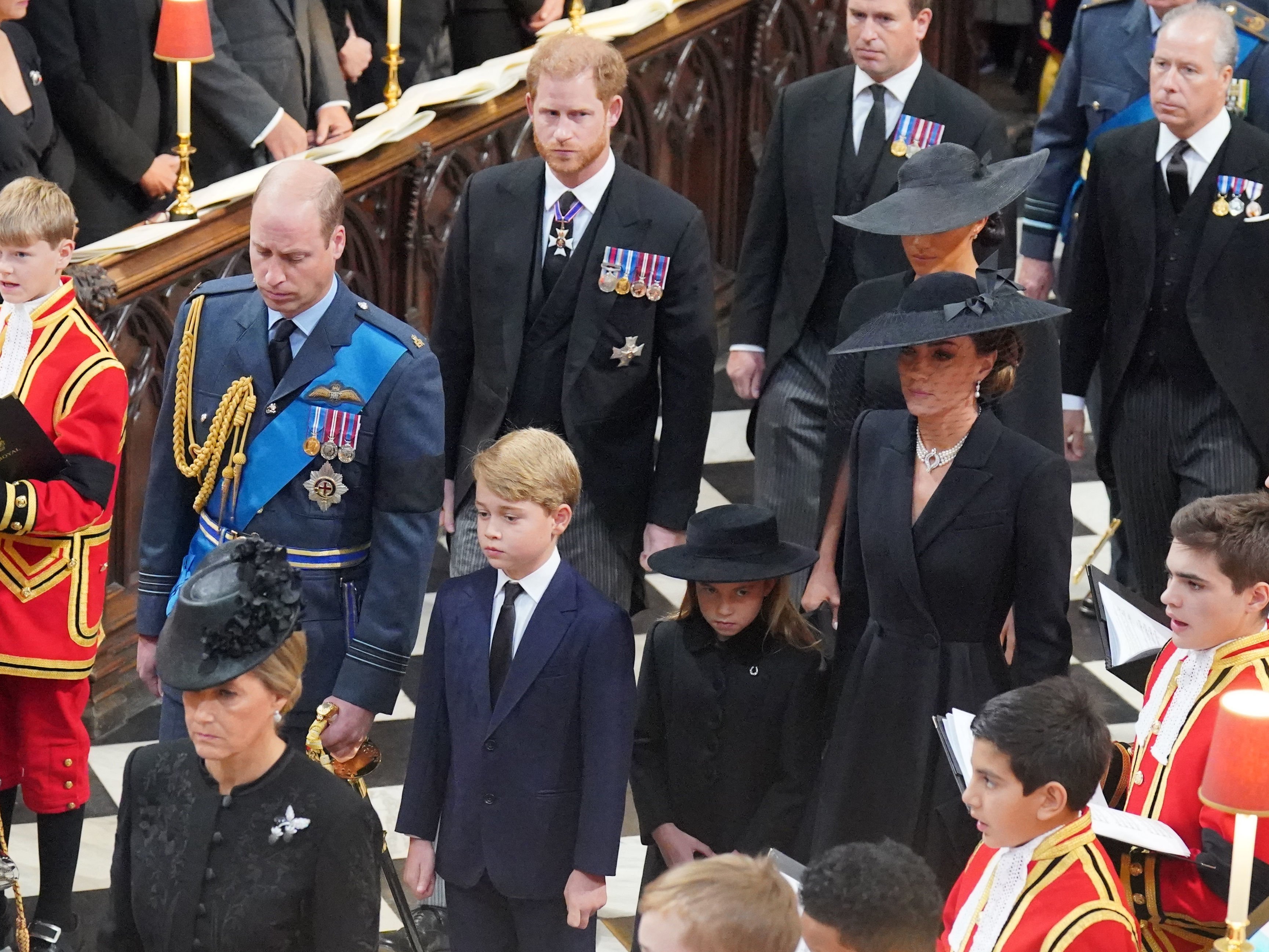 Prince William, the Prince of Wales, Prince George of Wales, Prince Harry, the Duke of Sussex, Meghan, the Duchess of Sussex and Catherine, the Princess of Wales, during the state funeral of Queen Elizabeth II at the Westminster Abbey on September 19, 2022, in London, England. | Source: Getty Images