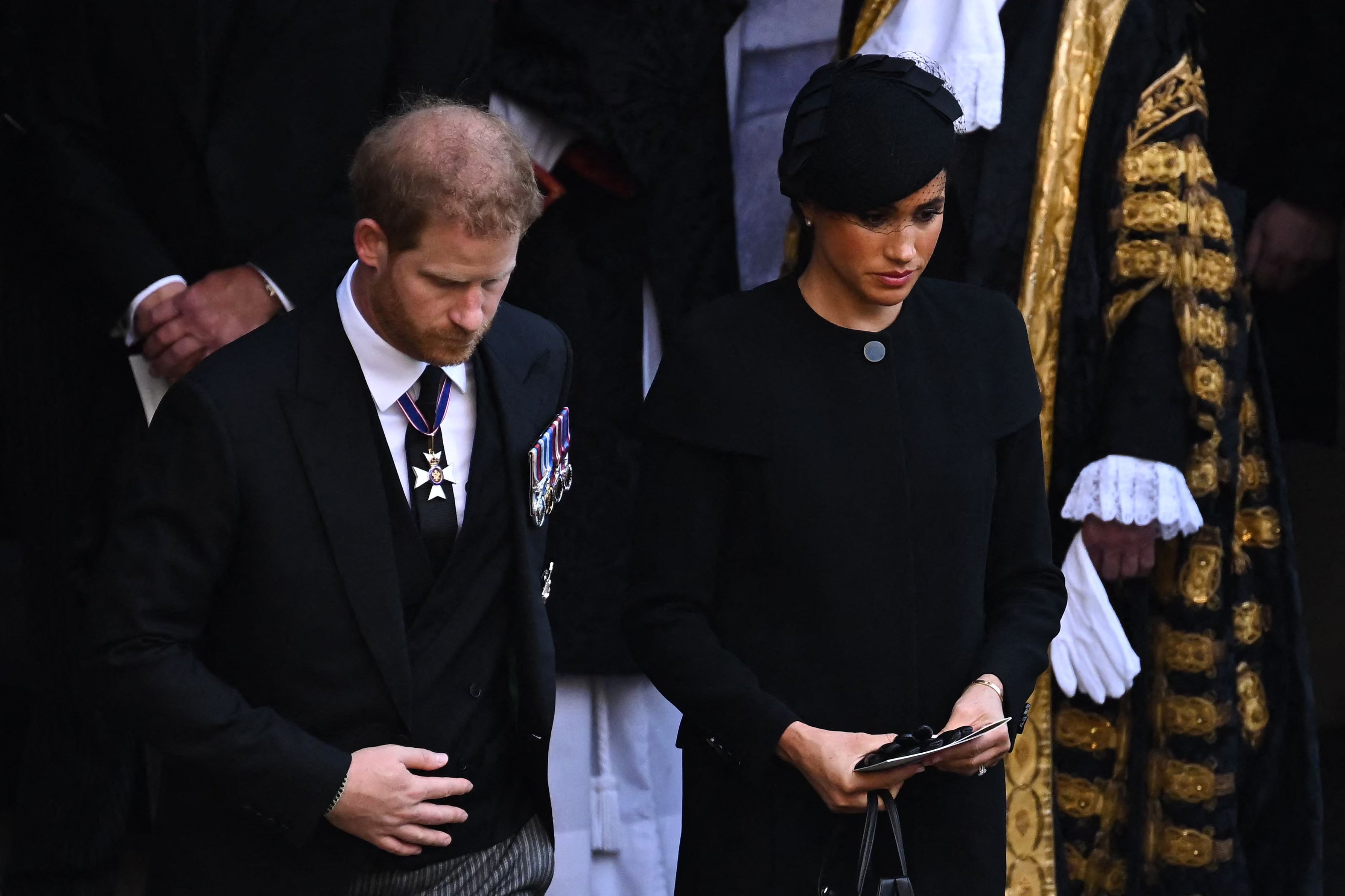 Prince Harry, Duke of Sussex and Meghan, Duchess of Sussex leave after a service for Queen Elizabeth II's coffin reception in Westminster Hall, at the Palace of Westminster in London on September 14, 2022 |  Source: Getty Images 