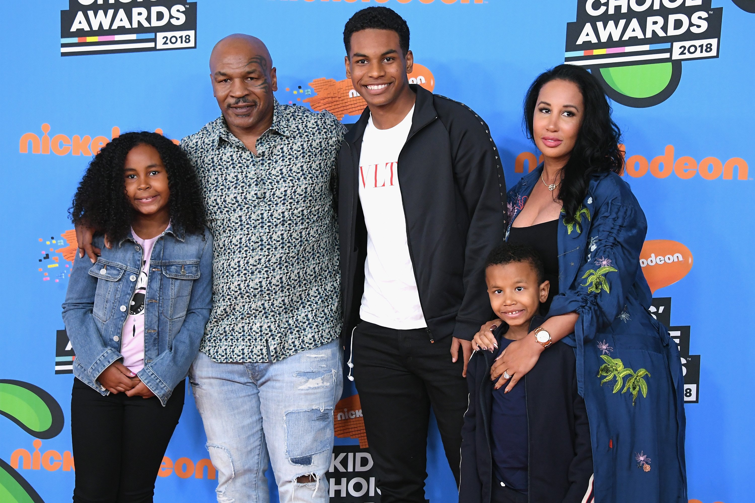 Mike Tyson with Lakiha Tyson and Milan Tyson, Miguel Tyson and Morocco Tyson at The Forum on March 24, 2018 in Inglewood, California.  |  Source: Getty Images
