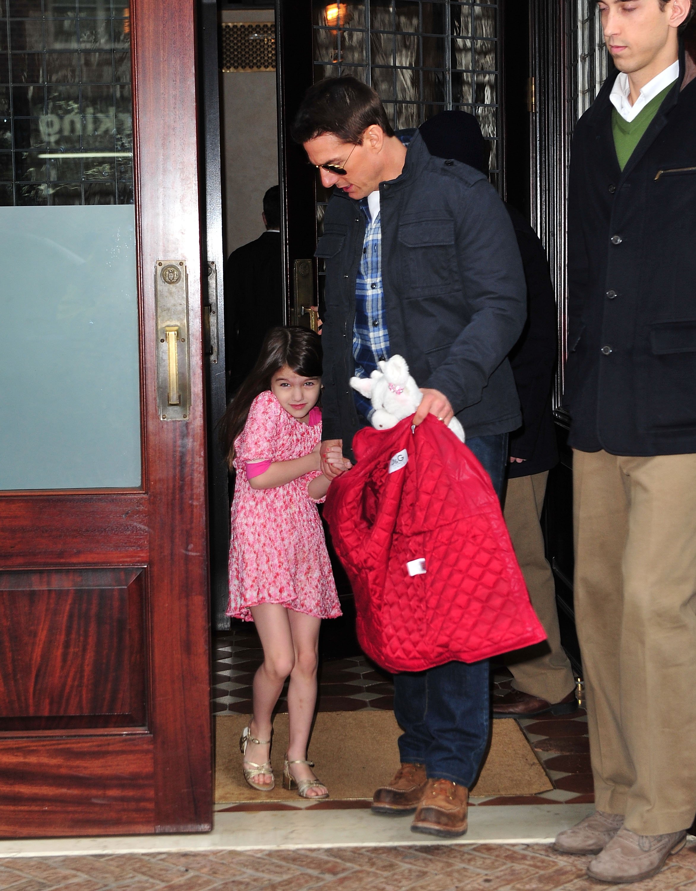 Tom Cruise and Suri Cruise on the streets of Manhattan on December 16, 2011 in New York City.  |  Source: Getty Images