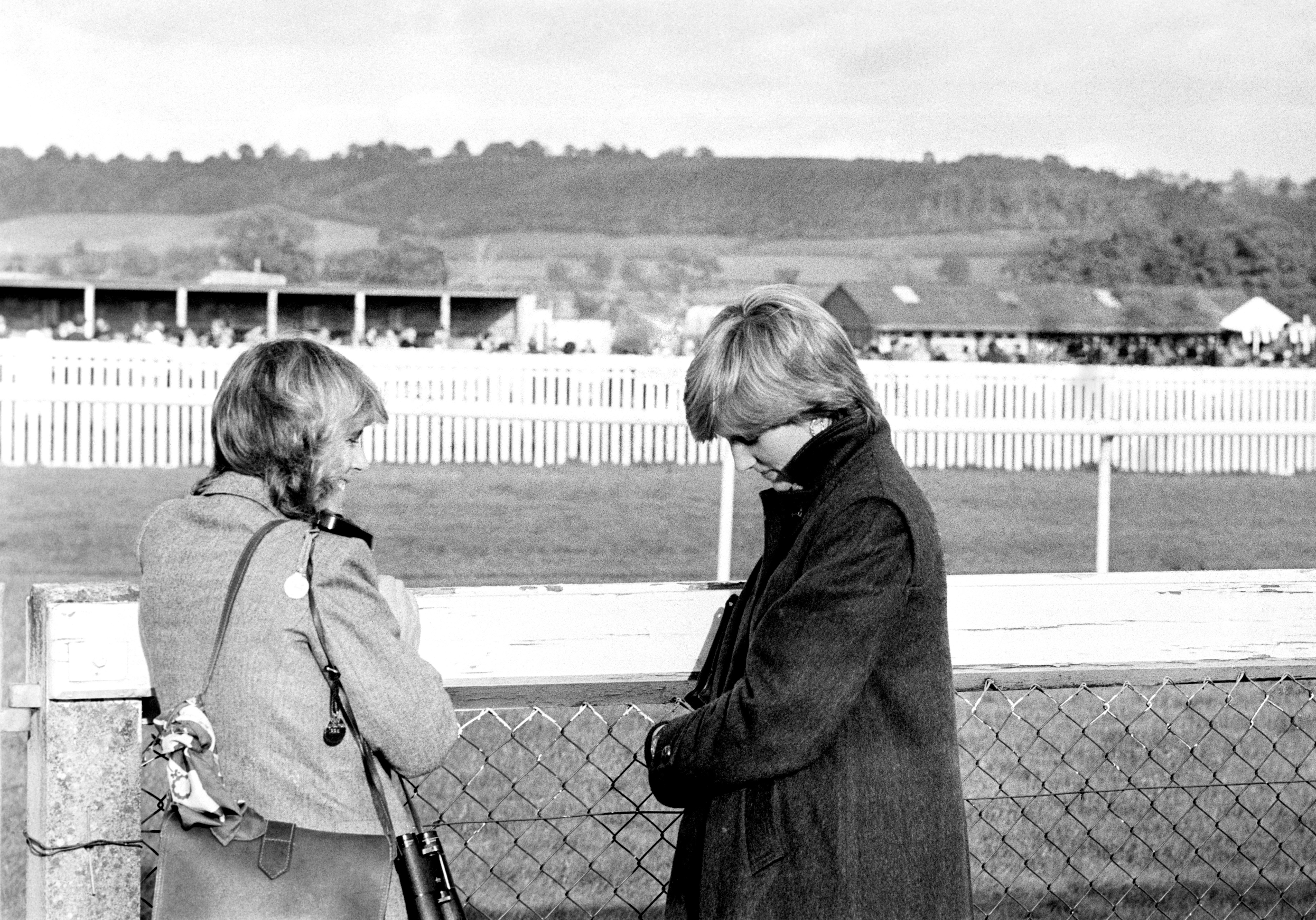 Princess Diana and Queen Consort Camilla at Ludlow Racecourse in England in 1980. |  Source: Getty Images 